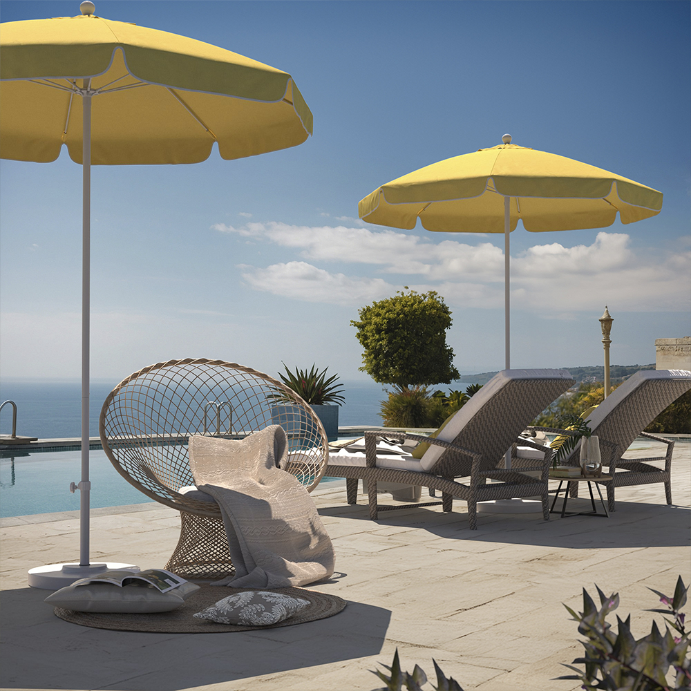 Image of the Coast Series Patio Umbrella by California Umbrella, epitomizing refined coastal comfort with its elegantly curved canopy and bay-like valance edges that mimic the soft curves of the shoreline. This umbrella combines form and function, crafted with a lightweight, rust-resistant aluminum frame and flexible fiberglass ribs that adapt to breezy seaside conditions. The robust center mast provides stable anchoring, while the effortless push-open mechanism ensures easy operation. Designed to withstand the challenges of coastal environments, the Coast Series offers a striking silhouette and reliable shade, enhancing any outdoor space with its coastal sophistication and durable construction.