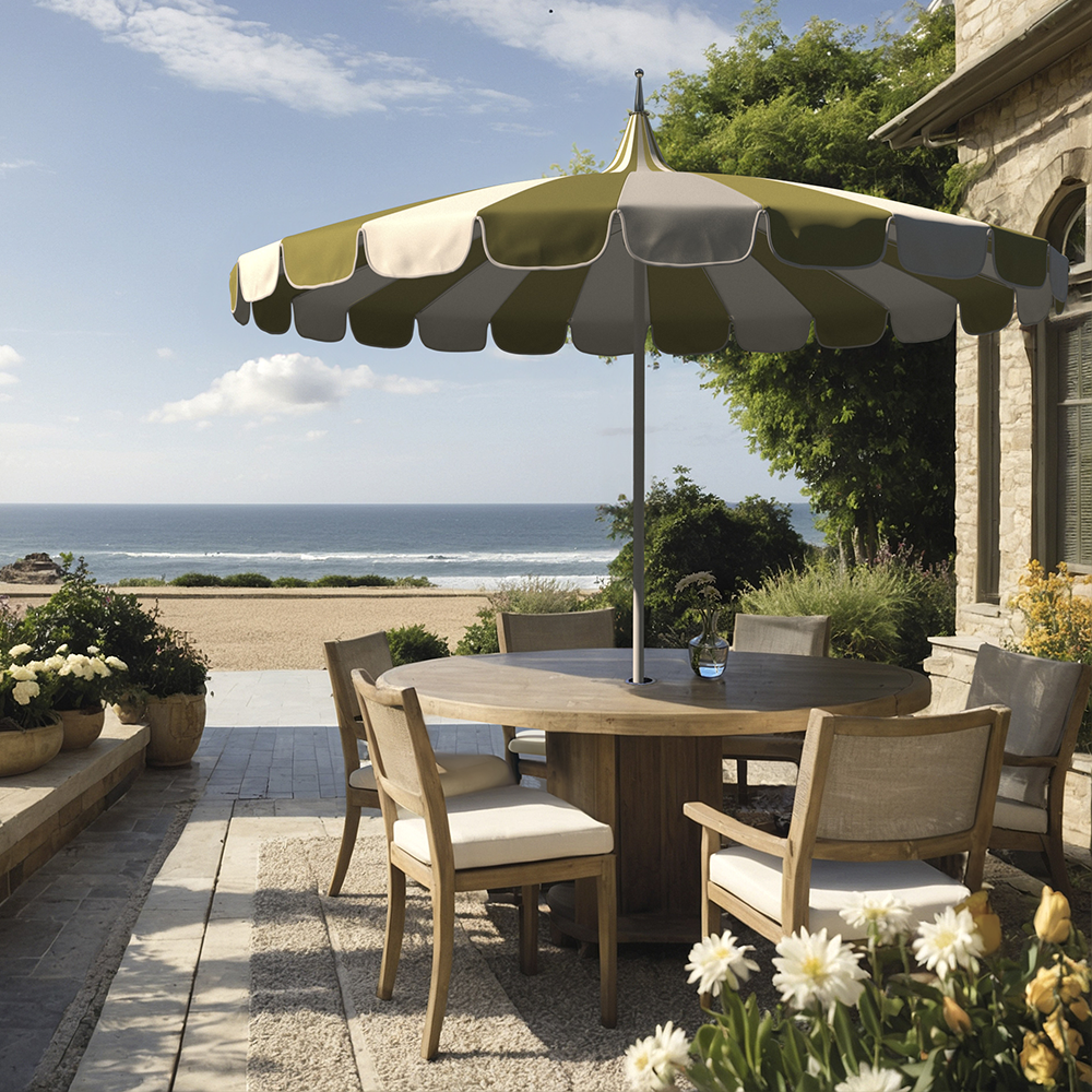 Image of the Pagoda Series Patio Umbrella by California Umbrella, displaying its unique pagoda-style inspired by traditional pagoda architecture. This commercial-grade umbrella stands as a statement piece, bringing classic sophistication to both commercial settings and residential outdoor spaces. It features a sturdy aluminum pole and flexible fiberglass ribs, ensuring stability and resilience in breezy conditions, ideal for high-traffic areas like restaurants and resorts, as well as private backyards. The easy crank lift and push-stop pin mechanism facilitate effortless operation, merging heritage, style, and performance to transform any setting into an elegant outdoor sanctuary.