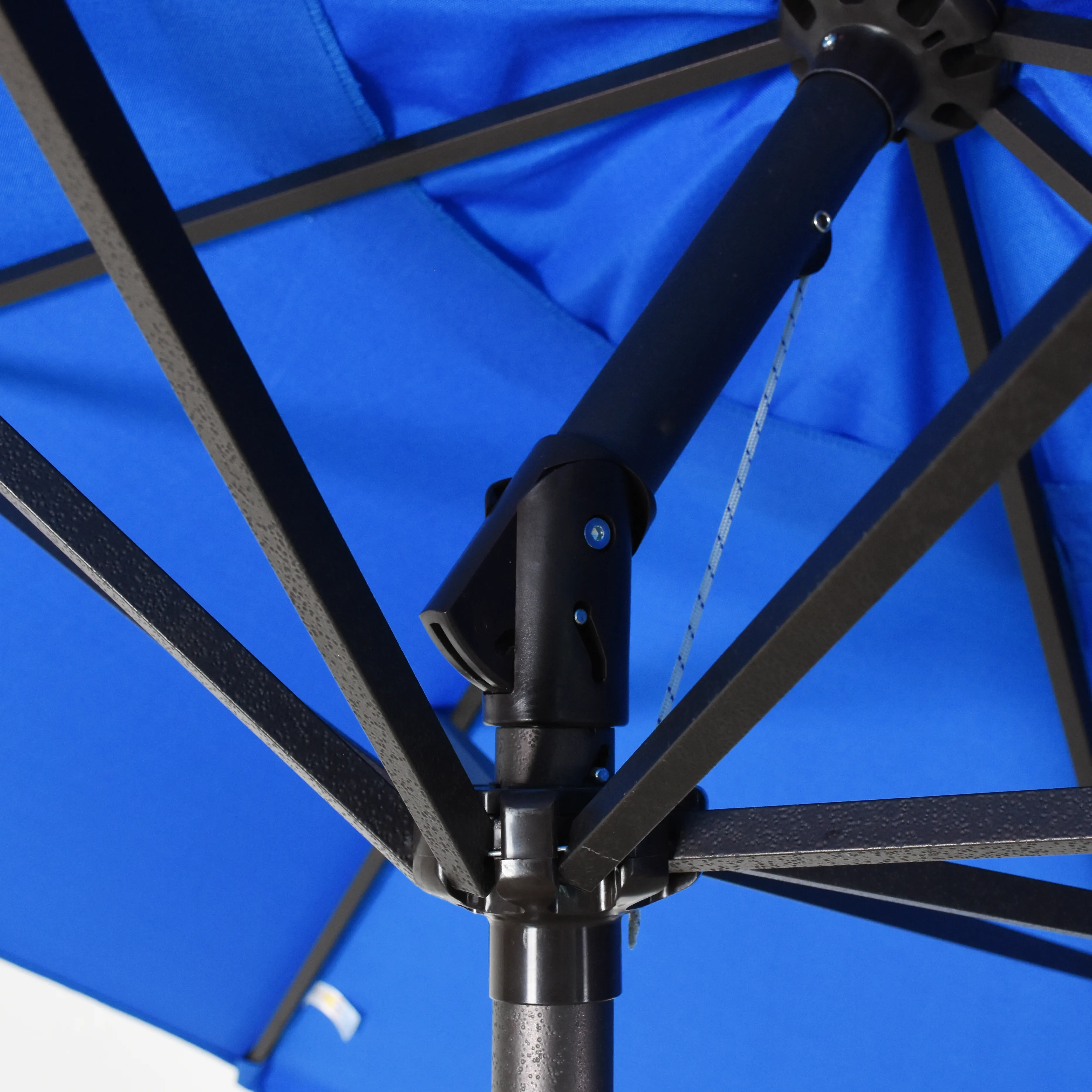 Image demonstrating the seamless auto tilt feature of the Casa Series Residential Grade Patio Umbrella by California Umbrella, highlighting the effortless adjustment for optimal shade positioning.