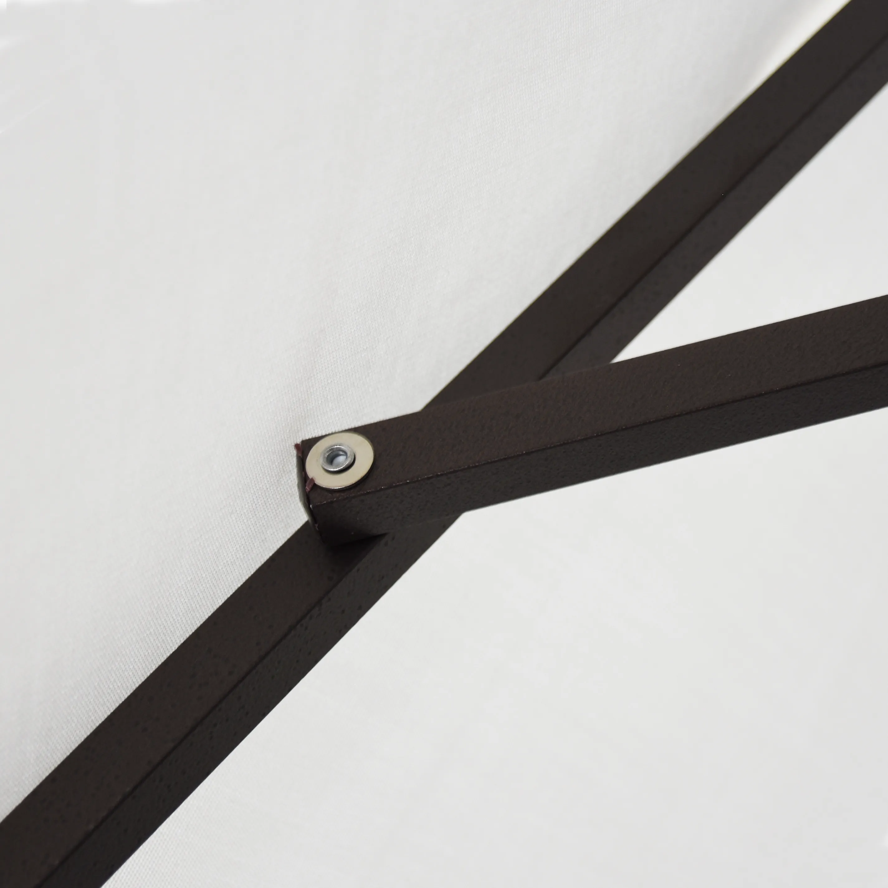Image highlighting the strong and reliable aluminum ribs of the Casa Series Residential Grade Patio Umbrella by California Umbrella, designed for enhanced durability and wind resistance.
