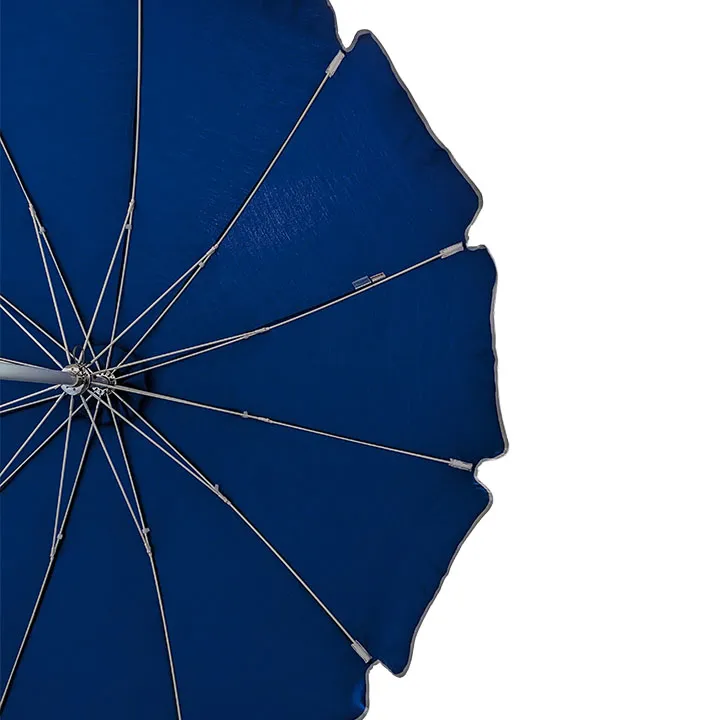 An image highlighting the flexible and durable fiberglass ribs of the Pagoda Umbrella, providing superior wind resistance and structural support for the Sunbrella fabric canopy.
