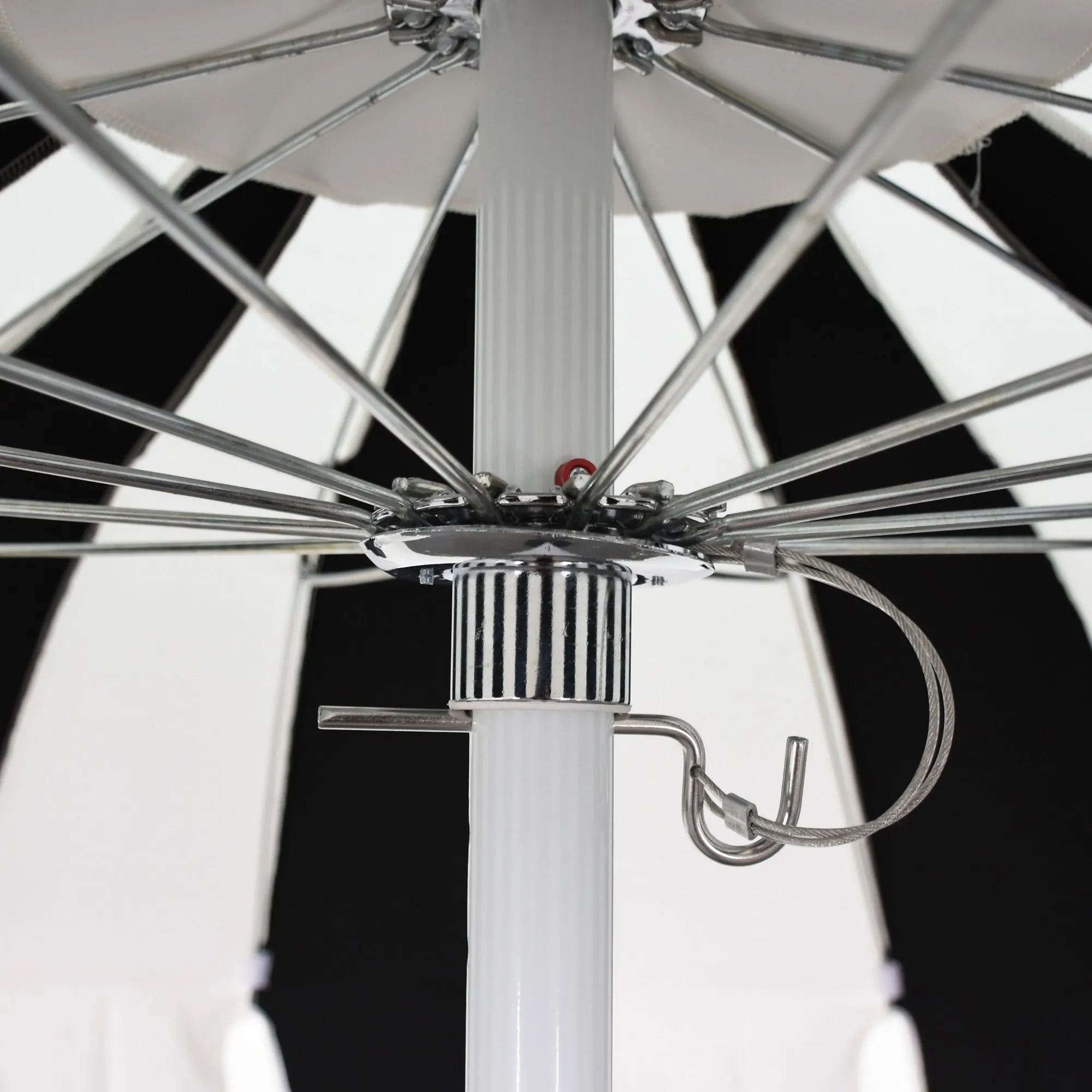 An image displaying the effortless push lift mechanism of the Pagoda Umbrella, allowing for smooth and easy operation when opening and closing the canopy.