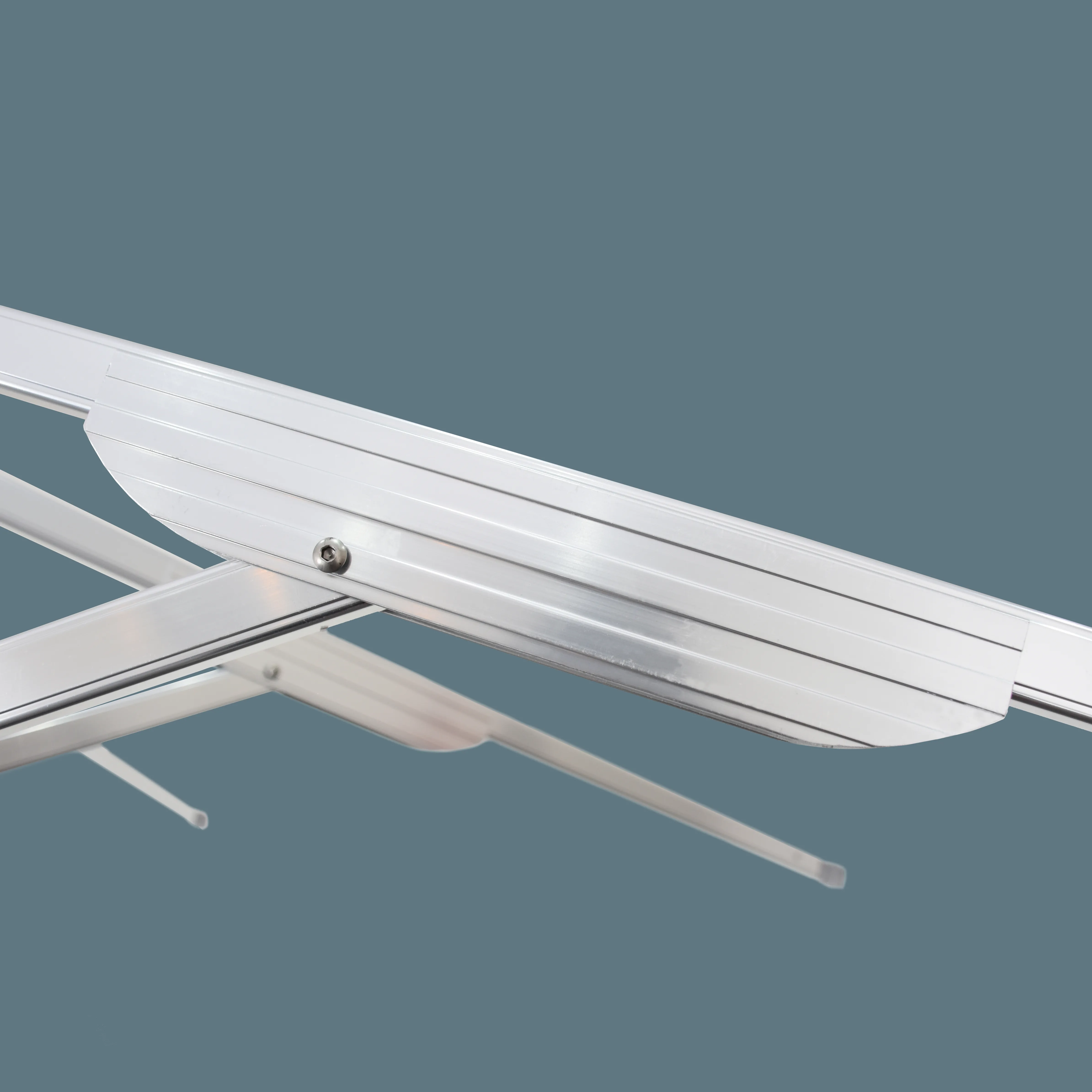 Reinforced aluminum ribs of the Rodeo Series commercial patio umbrella by California Umbrella, offering superior strength and support for outdoor durability.